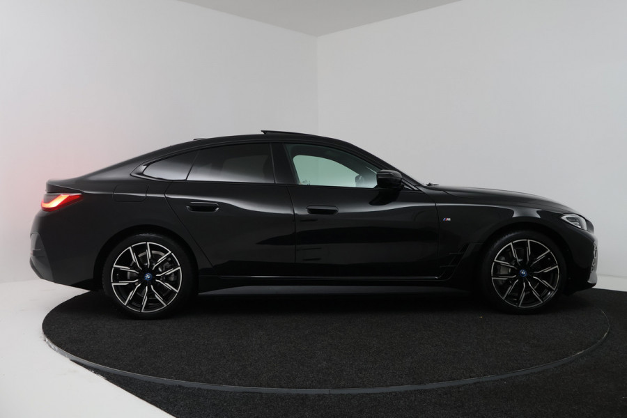 BMW i4 eDrive40 High Executive 84 kWh (PANORAMADAK, STOELVERWARMING, CARPLAY, LED)