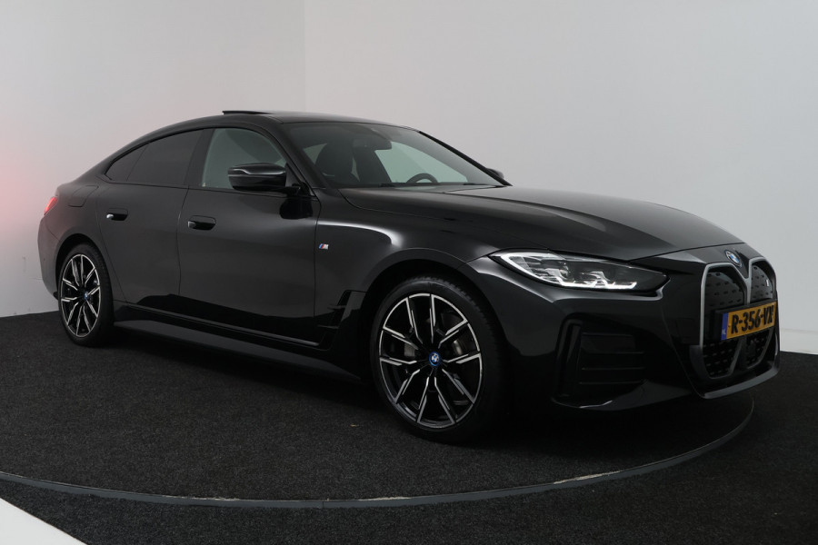 BMW i4 eDrive40 High Executive 84 kWh (PANORAMADAK, STOELVERWARMING, CARPLAY, LED)