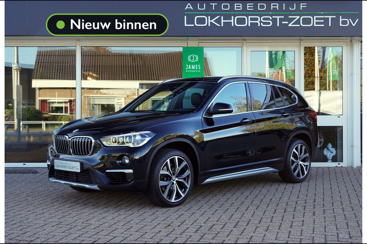 BMW X1 sDrive20i Orange Edition II | Panorama | Trekhaak | ACC | Leer | H/K