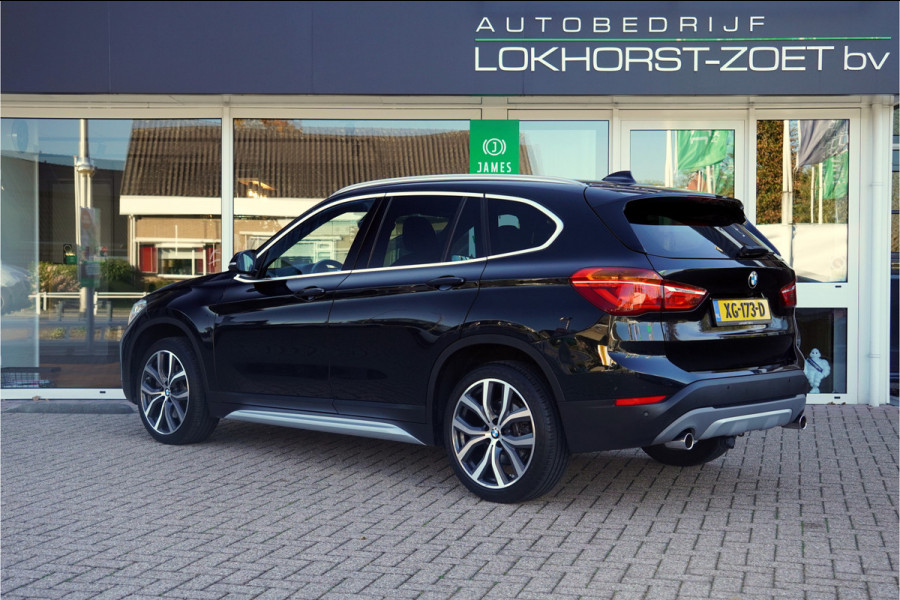 BMW X1 sDrive20i Orange Edition II | Panorama | Trekhaak | ACC | Leer | H/K