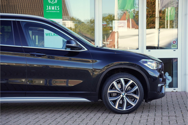 BMW X1 sDrive20i Orange Edition II | Panorama | Trekhaak | ACC | Leer | H/K