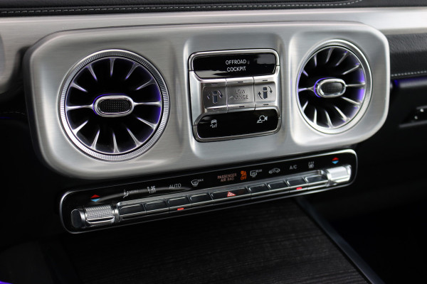 Mercedes-Benz G-Klasse 580 AMG Line 116 kWh | Schuifdak | Techniekpakket | Distronic | Burmester | Nappa Leder | Verwarmd Stuurwiel | Surround Camera | Augmented Reality | Keyless Go |