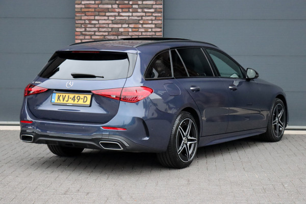 Mercedes-Benz C-Klasse Estate 300 e AMG Line Premium | Panoramadak | Memory | Distronic | Surround Camera | Trekhaak | Digital Light | Nightpakket | Augmented Reality |