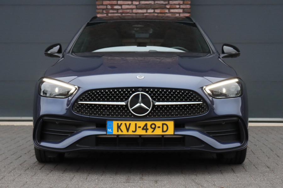 Mercedes-Benz C-Klasse Estate 300 e AMG Line Premium | Panoramadak | Memory | Distronic | Surround Camera | Trekhaak | Digital Light | Nightpakket | Augmented Reality |
