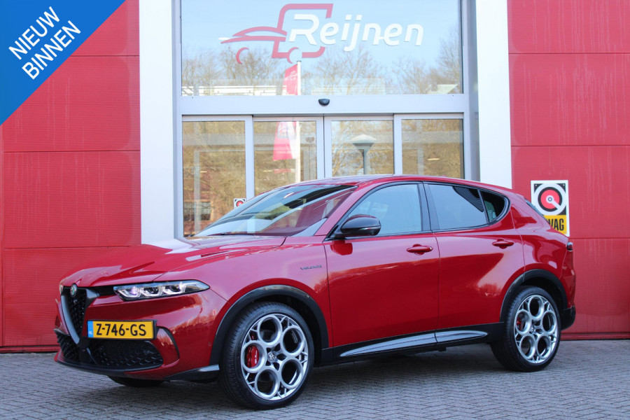 Alfa Romeo Tonale 1.5T 160PK HYbrid VELOCE | LEDEREN BEKLEDING | VOORSTOELEN / STUUR VERWARMD | VOORSTOELEN GEVENTILEERD | VOORSTOELEN ELEKTRISCH VERSTELBAAR MET GEHEUGEN FUNCTIE |  HARMAN CARDON PREMIUM AUDIO | DRAADLOOS APPLE CARPLAY / ANDROID AUTO | 360° CAMERA | AUTOMATISCH DIMMENDE BUITENSPIEGELS | 20"INCH LICHTMETALEN VELGEN | ADAPTIVE CRUISE CONTROL | KEYLESS ENTRY / START | ELEKTRISCH BEDIENBARE ACHTERKLEP | DRAADLOZE TELEFOONLADER | AMBIENT LIGHTING | DONKERE HEMELBEKLEDING | SCHAKELFLIPPERS AAN HET STUUR | VERWARMDE RUITENSPROEIERS |