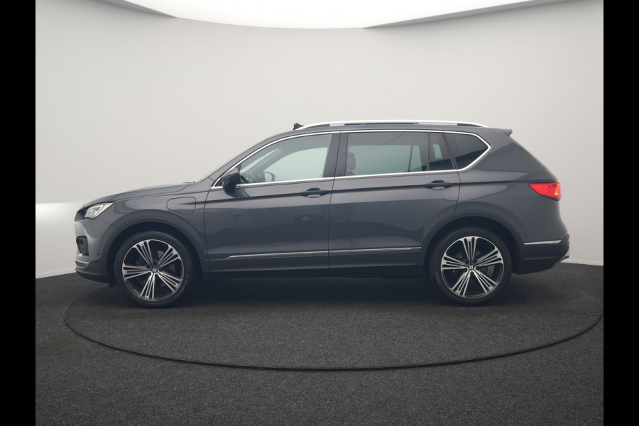 Seat Tarraco 1.4 TSI e-Hybrid Xcellence PHEV 245pk Dealer O.H. | SOH 91,7% | | Panodak | Adaptive Cruise | 360 Camera | Sfeerverlichting | Voorstoelen Verwarmd | Keyless | Blis | Apple Carplay | Navigatie | DAB | Plug In Hybrid |