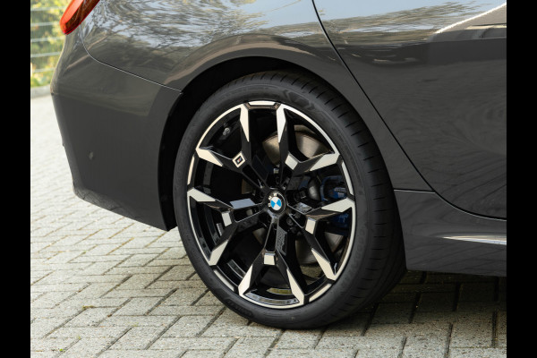 BMW 3 Serie Touring M340i xDrive - Pano - Head-up - Individual ''Dravit Grau'' - M Adaptief Onderstel