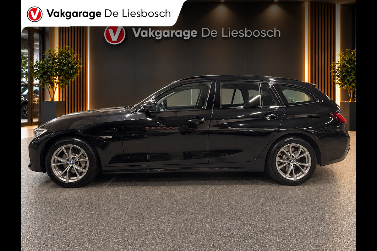 BMW 3 Serie Touring 330e Business Edition Plus / trekhaak / sportstoelen / cruise