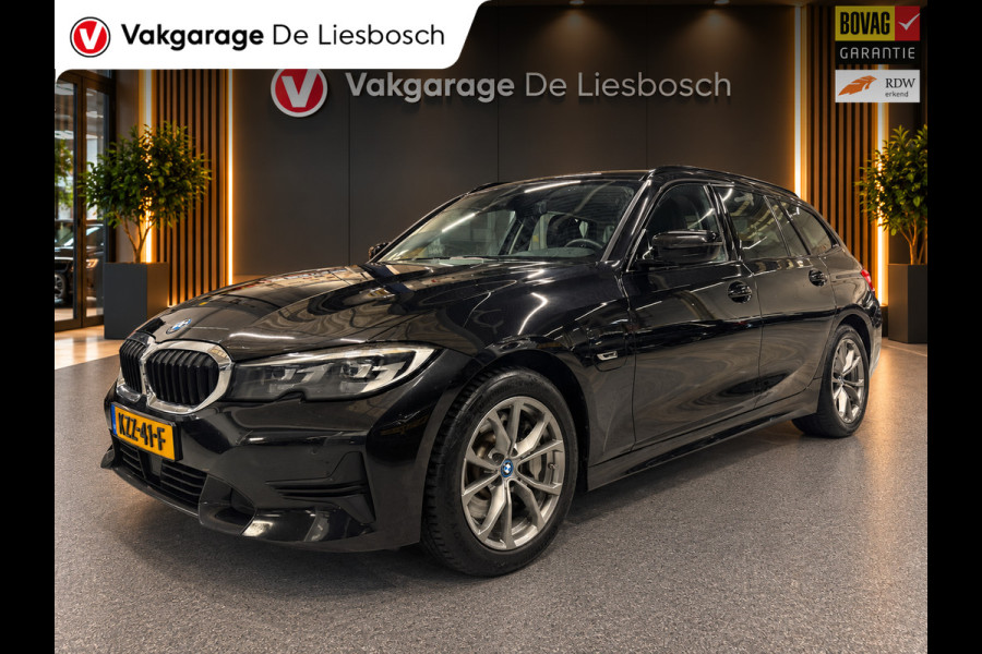 BMW 3 Serie Touring 330e Business Edition Plus / trekhaak / sportstoelen / cruise