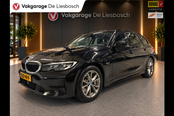 BMW 3 Serie Touring 330e Business Edition Plus / trekhaak / sportstoelen / cruise