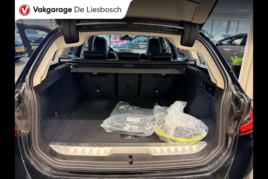 BMW 3 Serie Touring 330e Business Edition Plus / trekhaak / sportstoelen / cruise
