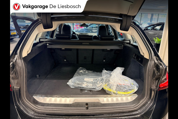 BMW 3 Serie Touring 330e Business Edition Plus / trekhaak / sportstoelen / cruise