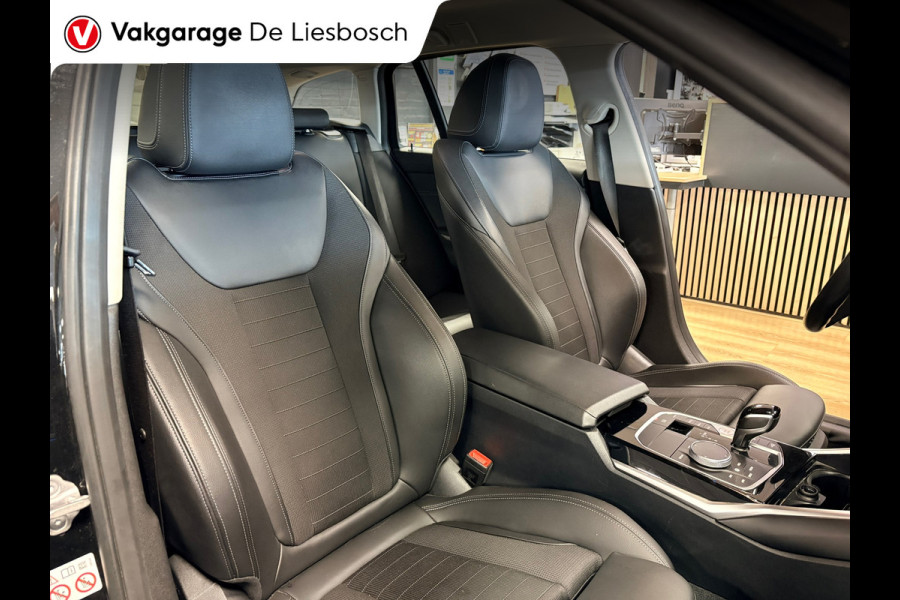 BMW 3 Serie Touring 330e Business Edition Plus / trekhaak / sportstoelen / cruise