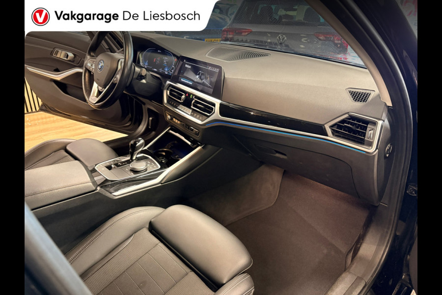 BMW 3 Serie Touring 330e Business Edition Plus / trekhaak / sportstoelen / cruise