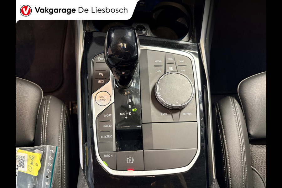 BMW 3 Serie Touring 330e Business Edition Plus / trekhaak / sportstoelen / cruise