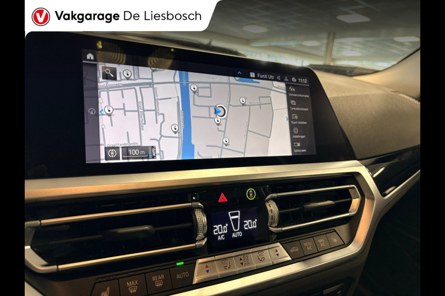 BMW 3 Serie Touring 330e Business Edition Plus / trekhaak / sportstoelen / cruise