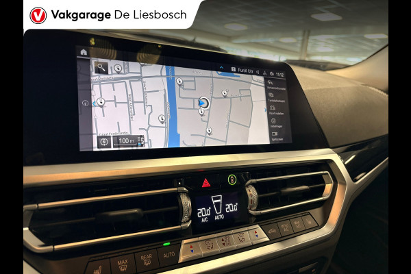 BMW 3 Serie Touring 330e Business Edition Plus / trekhaak / sportstoelen / cruise