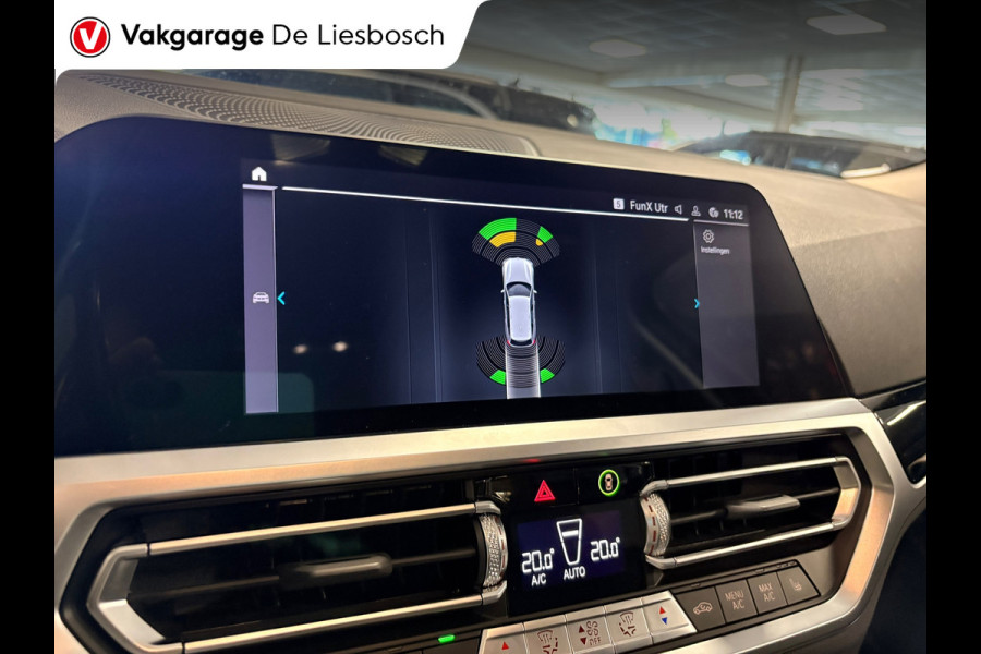 BMW 3 Serie Touring 330e Business Edition Plus / trekhaak / sportstoelen / cruise
