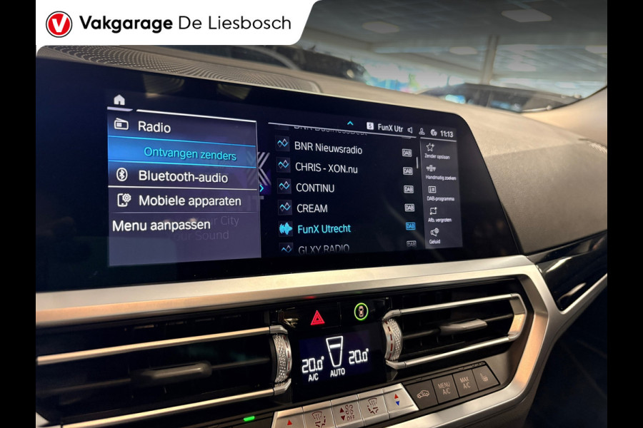 BMW 3 Serie Touring 330e Business Edition Plus / trekhaak / sportstoelen / cruise