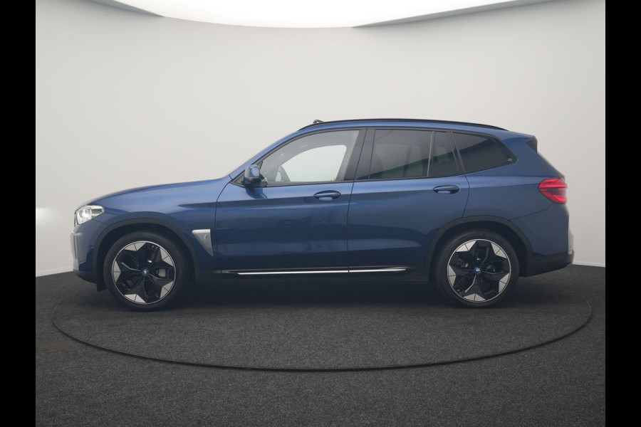 BMW iX3 High Executive 80 kWh 286pk Dealer O.H | Panodak | Head Up | Adaptive Cruise | 360 Camera | Harman / Kardon | Lederen Sportstoelen Memory & Verwarmd | Keyless | Apple Carplay | Blis | Sfeerverlichting | DAB | Navigatie | 20"L.M |