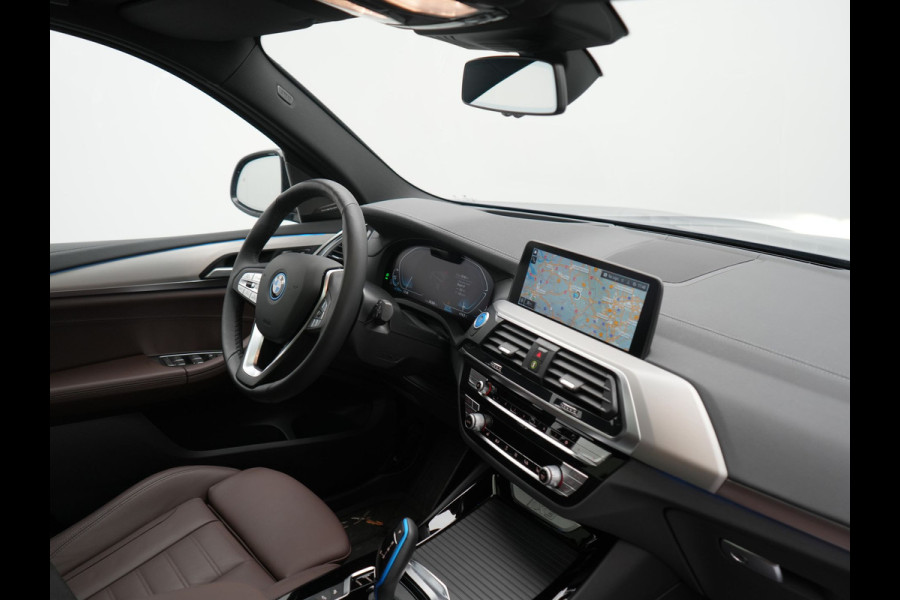 BMW iX3 High Executive 80 kWh 286pk Dealer O.H | Panodak | Head Up | Adaptive Cruise | 360 Camera | Harman / Kardon | Lederen Sportstoelen Memory & Verwarmd | Keyless | Apple Carplay | Blis | Sfeerverlichting | DAB | Navigatie | 20"L.M |