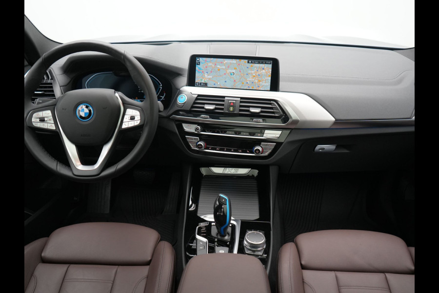 BMW iX3 High Executive 80 kWh 286pk Dealer O.H | Panodak | Head Up | Adaptive Cruise | 360 Camera | Harman / Kardon | Lederen Sportstoelen Memory & Verwarmd | Keyless | Apple Carplay | Blis | Sfeerverlichting | DAB | Navigatie | 20"L.M |