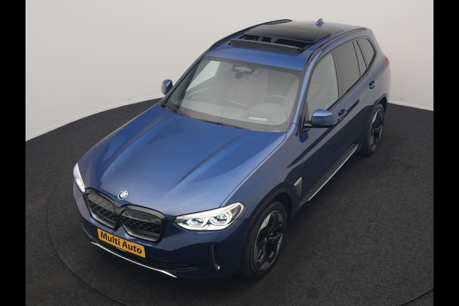 BMW iX3 High Executive 80 kWh 286pk Dealer O.H | Panodak | Head Up | Adaptive Cruise | 360 Camera | Harman / Kardon | Lederen Sportstoelen Memory & Verwarmd | Keyless | Apple Carplay | Blis | Sfeerverlichting | DAB | Navigatie | 20"L.M |