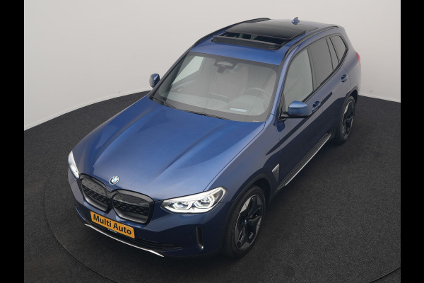 BMW iX3 High Executive 80 kWh 286pk Dealer O.H | Panodak | Head Up | Adaptive Cruise | 360 Camera | Harman / Kardon | Lederen Sportstoelen Memory & Verwarmd | Keyless | Apple Carplay | Blis | Sfeerverlichting | DAB | Navigatie | 20"L.M |