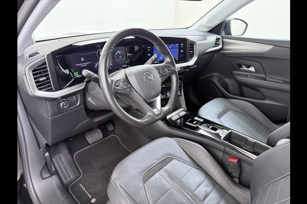 Opel Mokka-e 136PK Automaat Adap.Cruise Warmtepomp Leder 360°Camera Stoelverwarming Navi Android Auto Apple Carplay 50kWh SOH 87% Business El Ecc Privacy Glas Led Isofix DAB Bluetooth Lmv 17" Regen-Lichtsensor Lane Assist 1e Eigenaar Dealeronderhouden Origineel Nederlandse Auto