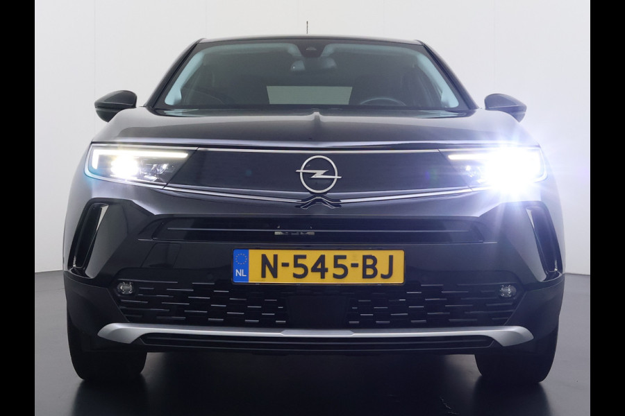 Opel Mokka-e 136PK Automaat Adap.Cruise Warmtepomp Leder 360°Camera Stoelverwarming Navi Android Auto Apple Carplay 50kWh SOH 87% Business El Ecc Privacy Glas Led Isofix DAB Bluetooth Lmv 17" Regen-Lichtsensor Lane Assist 1e Eigenaar Dealeronderhouden Origineel Nederlandse Auto