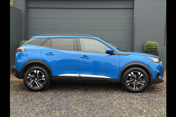 Peugeot 2008 1.2 PureTech Blue Lease Allure ✓2e Eigenaar✓360° Camera✓Draadloze telefoonlader✓Carplay✓6 bak✓Halfleder✓Navi✓Clima✓Cruise✓17'' Lmv✓Rijstrooksensor✓102pk✓Dealer onderhouden✓N.A.P✓Apk tot 04-2027