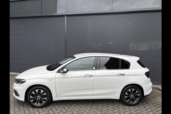 Fiat Tipo 1.4 Mirror Achteruitrijcamera - Airco - Parkeersensor achter - Licht metalen velgen 16 inch - Radio - Navigatie - Mistlampen - Led verlichting - Stuur multifunctioneel - Bluetooth - Cruise control - Ele
