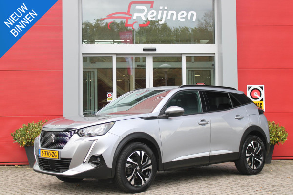 Peugeot 2008 1.2 130PK AUTOMAAT ALLURE PACK | TREKHAAK | ADAPTIVE CRUISE CONTROL | 3-D INSTRUMENTENPANEEL | NAVIGATIE | APPLE CARPLAY/ANDROID AUTO | LED KOPLAMPEN | CLIMATE CONTROL | 17" LICHTMETALEN VELGEN | ACHTERUITRIJ CAMERA | PARKEERSENSOREN | DAB+ RADIO | GETINTE RUITEN |