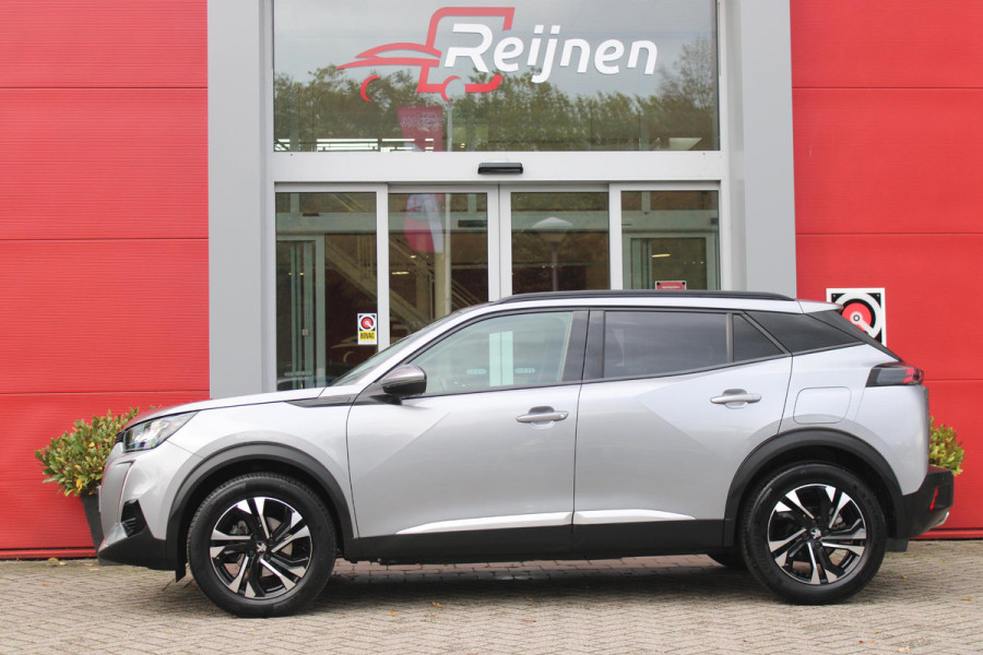 Peugeot 2008 1.2 130PK AUTOMAAT ALLURE PACK | TREKHAAK | ADAPTIVE CRUISE CONTROL | 3-D INSTRUMENTENPANEEL | NAVIGATIE | APPLE CARPLAY/ANDROID AUTO | LED KOPLAMPEN | CLIMATE CONTROL | 17" LICHTMETALEN VELGEN | ACHTERUITRIJ CAMERA | PARKEERSENSOREN | DAB+ RADIO | GETINTE RUITEN |