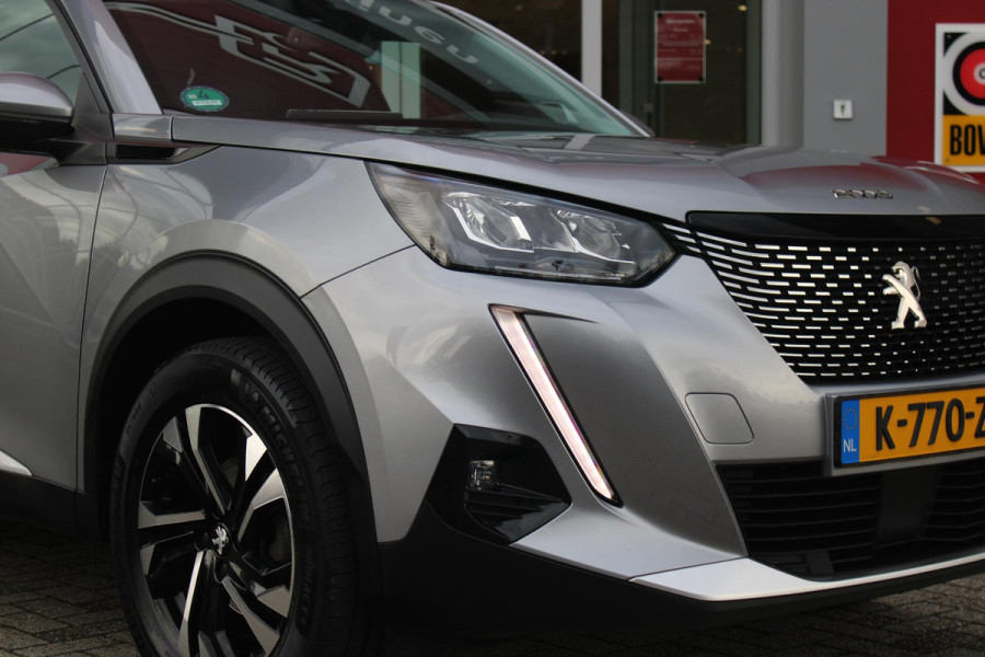 Peugeot 2008 1.2 130PK AUTOMAAT ALLURE PACK | TREKHAAK | ADAPTIVE CRUISE CONTROL | 3-D INSTRUMENTENPANEEL | NAVIGATIE | APPLE CARPLAY/ANDROID AUTO | LED KOPLAMPEN | CLIMATE CONTROL | 17" LICHTMETALEN VELGEN | ACHTERUITRIJ CAMERA | PARKEERSENSOREN | DAB+ RADIO | GETINTE RUITEN |