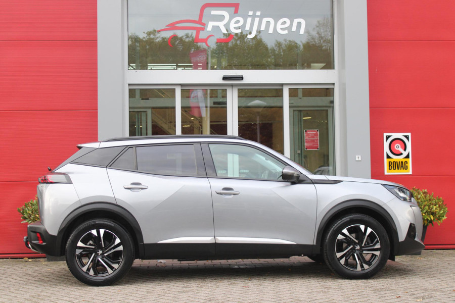 Peugeot 2008 1.2 130PK AUTOMAAT ALLURE PACK | TREKHAAK | ADAPTIVE CRUISE CONTROL | 3-D INSTRUMENTENPANEEL | NAVIGATIE | APPLE CARPLAY/ANDROID AUTO | LED KOPLAMPEN | CLIMATE CONTROL | 17" LICHTMETALEN VELGEN | ACHTERUITRIJ CAMERA | PARKEERSENSOREN | DAB+ RADIO | GETINTE RUITEN |