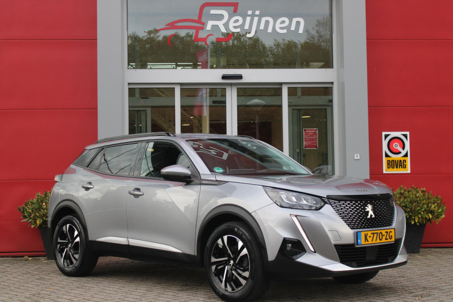 Peugeot 2008 1.2 130PK AUTOMAAT ALLURE PACK | TREKHAAK | ADAPTIVE CRUISE CONTROL | 3-D INSTRUMENTENPANEEL | NAVIGATIE | APPLE CARPLAY/ANDROID AUTO | LED KOPLAMPEN | CLIMATE CONTROL | 17" LICHTMETALEN VELGEN | ACHTERUITRIJ CAMERA | PARKEERSENSOREN | DAB+ RADIO | GETINTE RUITEN |