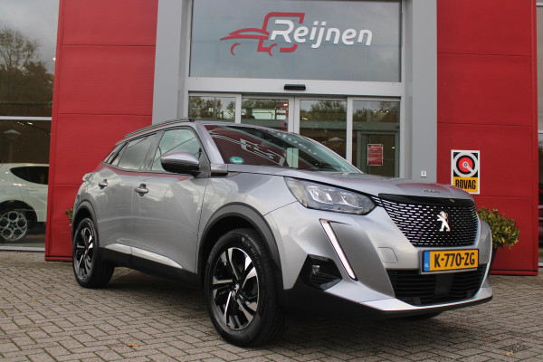 Peugeot 2008 1.2 130PK AUTOMAAT ALLURE PACK | TREKHAAK | ADAPTIVE CRUISE CONTROL | 3-D INSTRUMENTENPANEEL | NAVIGATIE | APPLE CARPLAY/ANDROID AUTO | LED KOPLAMPEN | CLIMATE CONTROL | 17" LICHTMETALEN VELGEN | ACHTERUITRIJ CAMERA | PARKEERSENSOREN | DAB+ RADIO | GETINTE RUITEN |