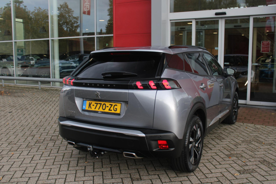Peugeot 2008 1.2 130PK AUTOMAAT ALLURE PACK | TREKHAAK | ADAPTIVE CRUISE CONTROL | 3-D INSTRUMENTENPANEEL | NAVIGATIE | APPLE CARPLAY/ANDROID AUTO | LED KOPLAMPEN | CLIMATE CONTROL | 17" LICHTMETALEN VELGEN | ACHTERUITRIJ CAMERA | PARKEERSENSOREN | DAB+ RADIO | GETINTE RUITEN |