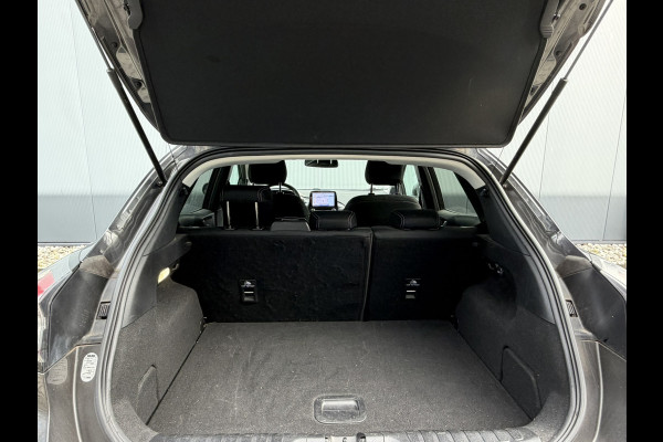 Ford Puma 1.0 EcoBoost Hybrid Titanium | Winterpack | Trekhaak | Navigatie | PDC | Meer foto's volgen