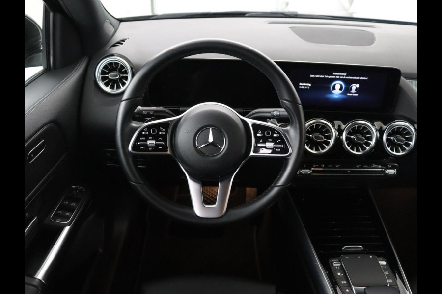 Mercedes-Benz EQA 250 Business Solution Luxury 67 kWh | SOH 95,3% | Half leder | Stoelverwarming | Adaptive cruise | Camera | Park assist | Sfeerverlichting