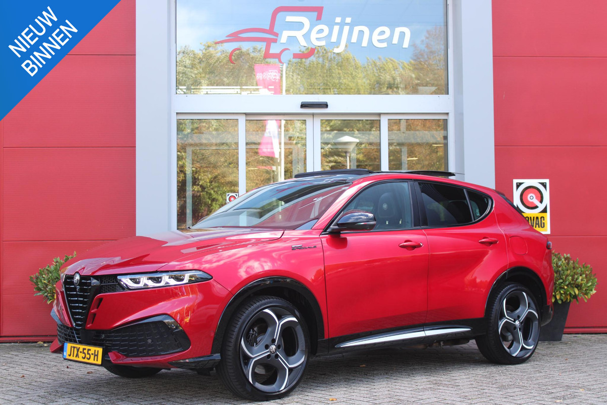 Alfa Romeo Tonale 1.3 270PK Ibrida Plug-In Q4 SPORT SPECIALE | PANORAMISCH SCHUIF KANTELDAK MET ZWARTE DAKSTRIPS | ROSSO BRERA (METALLIC ROOD) MET ZWART DAK  | HARMAN KARDON PREMIUM AUDIO MET 14 SPEAKERS | TECHNOLOGY PACK: PARKEERWAARSCHUWING VOOR EN ACHTER/360° CAMERA / AUTONOMOUS DRIVING LEVEL 2: ADAPTIVE CRUISE CONTROL/LANE CENTERING ASSIST/TRAFFIC JAM ASSIST DODEHOEK DETECTIE AUTOMATISCH DIMMENDE BUITENSPIEGELS ELEKTRISCH BEDIENBARE ACHTERKLEP | 20" LICHTMETALEN VELGEN FORI | DRAADLOZE TELEFOONLADER | NAVIGATIE | DRAADLOZE APPLE CARPLAY/ANDROID AUTO | FULL LED MATRIX KOPLAMPEN | LED