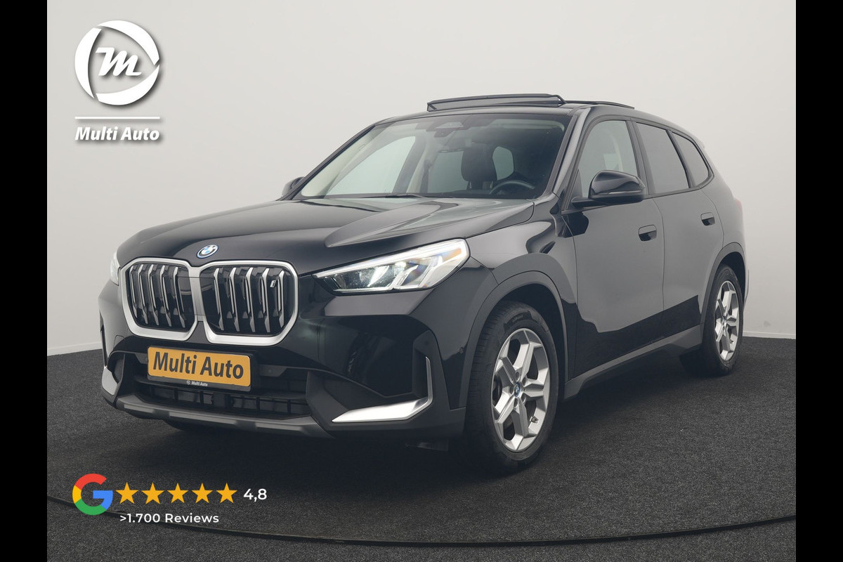 BMW iX1 xDrive30 67 kWh 313pk Dealer O.H | SOH 94,7% | Panodak | Camera | Stoelen Massage & Verwarmd | Blis | Apple Carplay | Cruise Control | DAB | Navigatie | Virtual | 18"L.M |