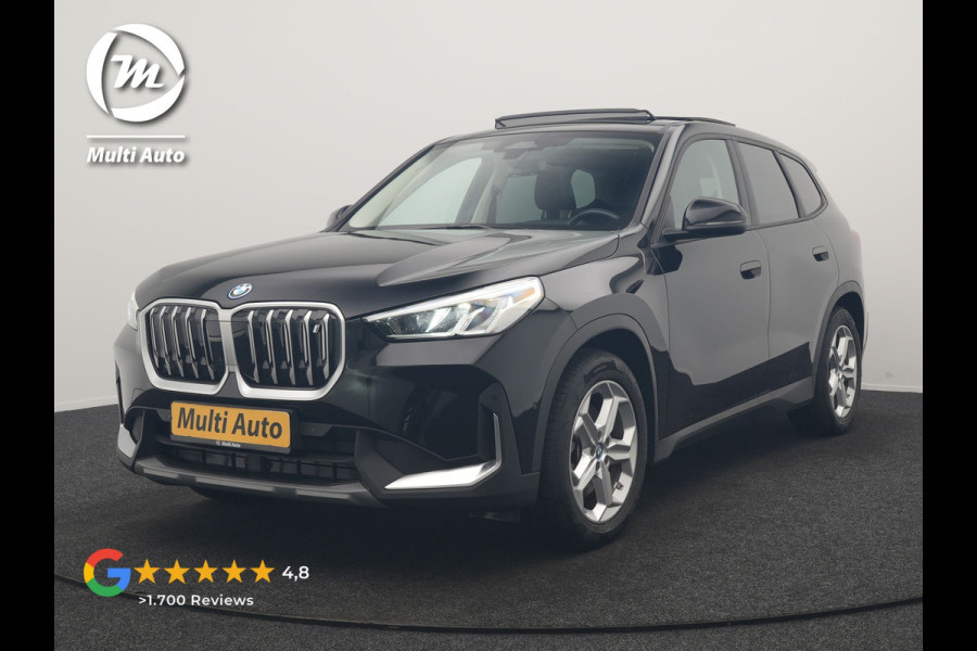 BMW iX1 xDrive30 67 kWh 313pk Dealer O.H | SOH 94,7% | Panodak | Camera | Stoelen Massage & Verwarmd | Blis | Apple Carplay | Cruise Control | DAB | Navigatie | Virtual | 18"L.M |