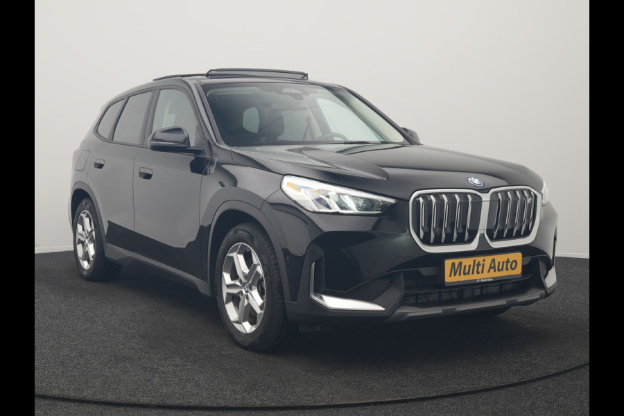 BMW iX1 xDrive30 67 kWh 313pk Dealer O.H | SOH 94,7% | Panodak | Camera | Stoelen Massage & Verwarmd | Blis | Apple Carplay | Cruise Control | DAB | Navigatie | Virtual | 18"L.M |