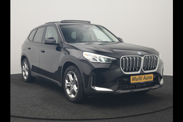 BMW iX1 xDrive30 67 kWh 313pk Dealer O.H | SOH 94,7% | Panodak | Camera | Stoelen Massage & Verwarmd | Blis | Apple Carplay | Cruise Control | DAB | Navigatie | Virtual | 18"L.M |