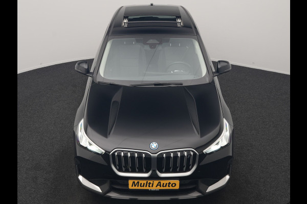 BMW iX1 xDrive30 67 kWh 313pk Dealer O.H | SOH 94,7% | Panodak | Camera | Stoelen Massage & Verwarmd | Blis | Apple Carplay | Cruise Control | DAB | Navigatie | Virtual | 18"L.M |