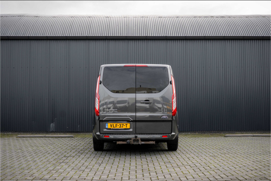 Ford Transit Custom 2.0 EcoBlue L2H1 | Platinum Edition | DC 5-Zits | Automaat | Camera | Cruise | 1e Eigenaar | PDC | Stoelverw. | Schuifdeur L+R |