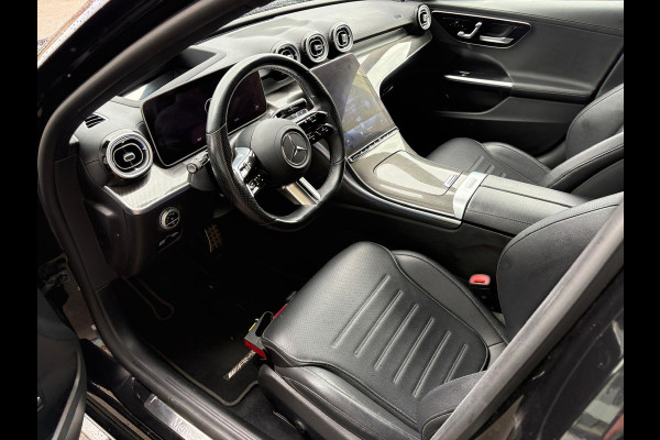 Mercedes-Benz C-Klasse 300 e Business Line Limited AMG | Panoramadak | Stoelverwarming | 360 Camera | Memory Seats | Dodehoekdetectie | Keyless | Ambiance Verlichting | Cruise Control | Navigatie | Leer