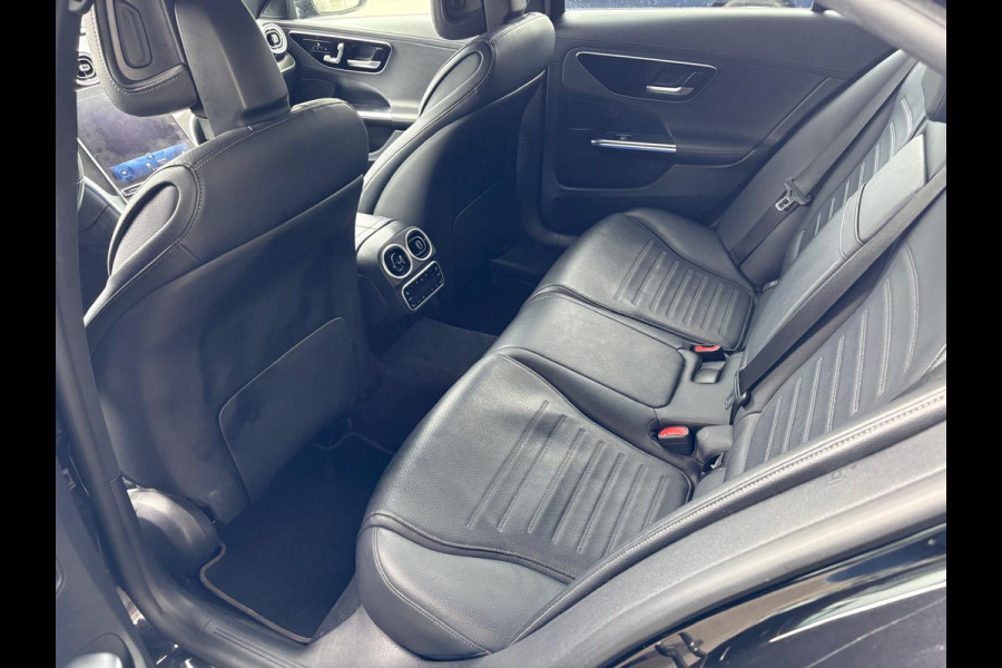 Mercedes-Benz C-Klasse 300 e Business Line Limited AMG | Panoramadak | Stoelverwarming | 360 Camera | Memory Seats | Dodehoekdetectie | Keyless | Ambiance Verlichting | Cruise Control | Navigatie | Leer